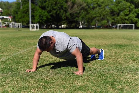 Staggered Push Up Step Two Push Your Body Off The Ground To Complete