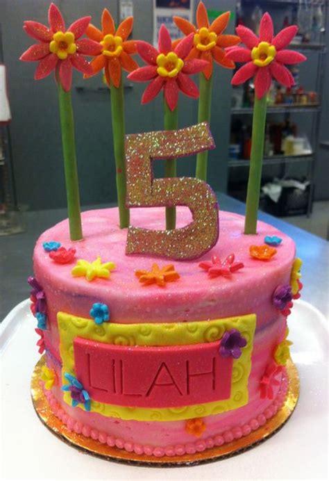 Round Pink Birthday Cake With Red Flowers And Stalks For 5 Year Old