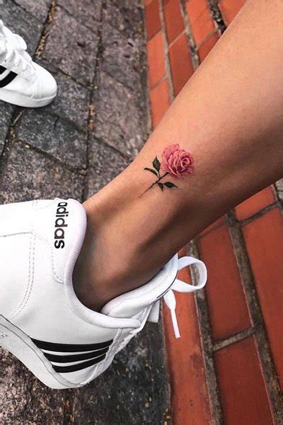 Has a rose heart tattoo just above her right ankle. 35 Gorgeous Rose Tattoo Ideas for Women - The Trend Spotter