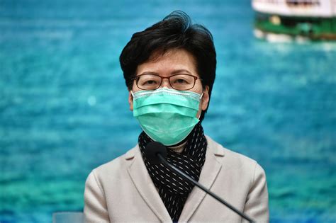 Last Year Carrie Lam Banned Face Masks Now Shes Wearing One In A