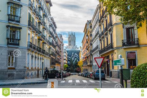 People Cross The Street In The City Of Madrid Spain