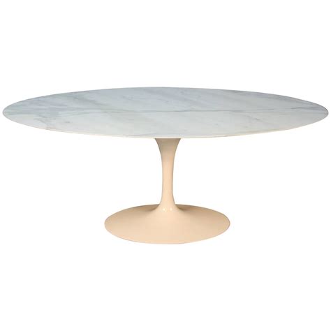 Don't worry, the area doesn't have to be a perfect square, it simply needs to have a length and breadth that are somewhat similar. Saarinen Oval Marble-Top Dining Table at 1stdibs