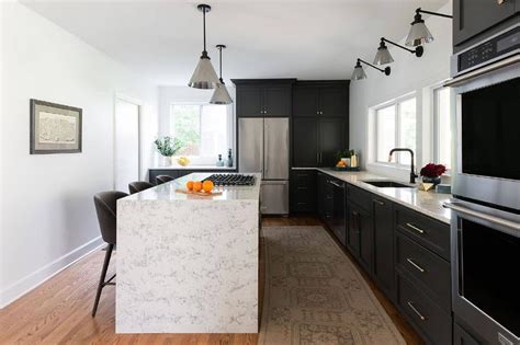 Black L Shaped Kitchen With Quartz Waterfall Edge Island Transitional