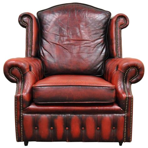 Striking Rolled Arm Tufted Chesterfield Style Lounge Chair In Red