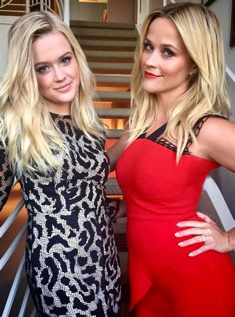 reese witherspoon with her daughter scrolller