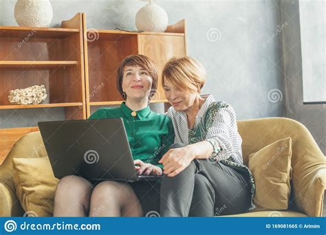 Two Cheerful Mature Women With Laptop At Home Stock Image Image Of Connection Beautiful