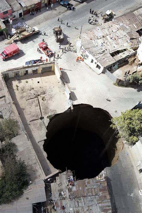 Third Florida Sinkhole Residents Evacuate As Sinkhole Appears In