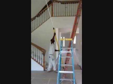 It has dreary low ceilings. How to Paint 18' Cathedral Ceilings - YouTube