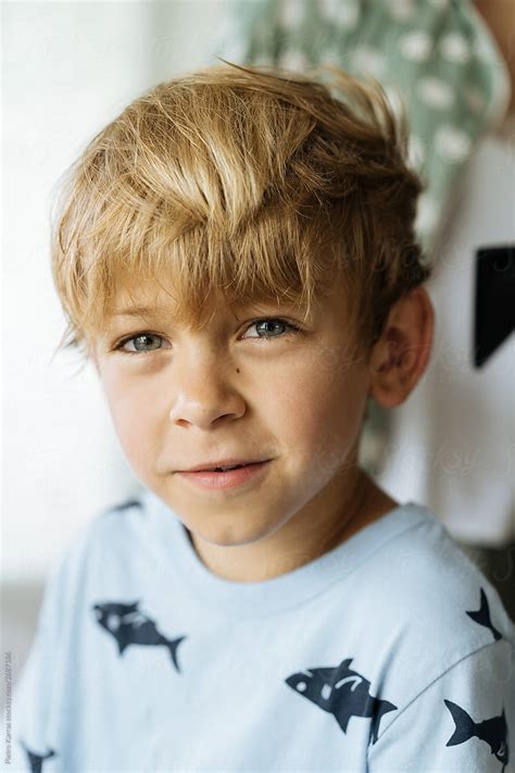 Cute Boy With Blond Hair And Green Eyes By Stocksy Contributor