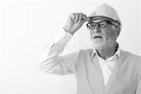 Close Up Of Handsome Senior Bearded Man Construction Worker Thinking