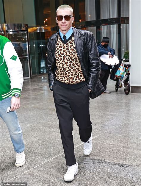 Macklemore Looks Stylish In A Leopard Print Sweater Vest While Out In