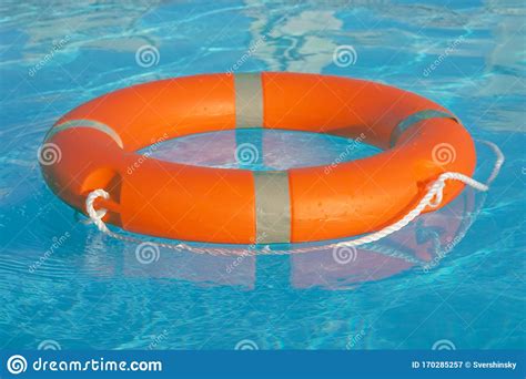 Lifebuoy Pool Ring Float Life Ring In Swimming Pool Stock Image