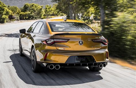 Rear Driver Angle Of A Gold 2021 Acura Tlx Type S