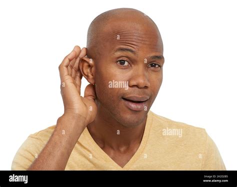 Say Again A Young Ethnic Man Holding His Hand Cupped Against His Ear