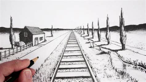 Someone Is Drawing A Train Track With Pencils