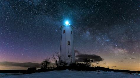 Lighthouse On A Starry Night