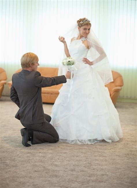 Groom With Bride Funny Pose In Hall Stock Image Image Of Give