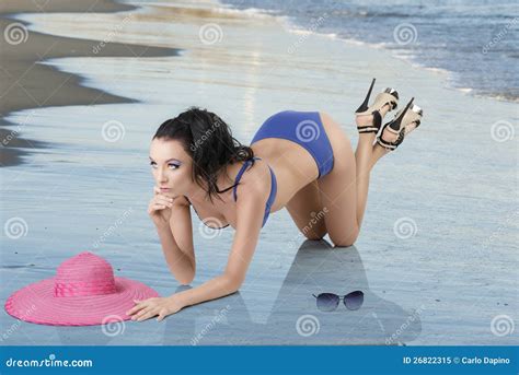 Pretty Brunette In Blue Bikini Is Kneeling Stock Image Image Of