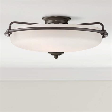 In a dining room, a beautiful chandelier will create a sense of class and formality, even if the furniture in the space isn't exactly formal. Quoizel Griffin Extra Large Bronze Floating Ceiling Light ...