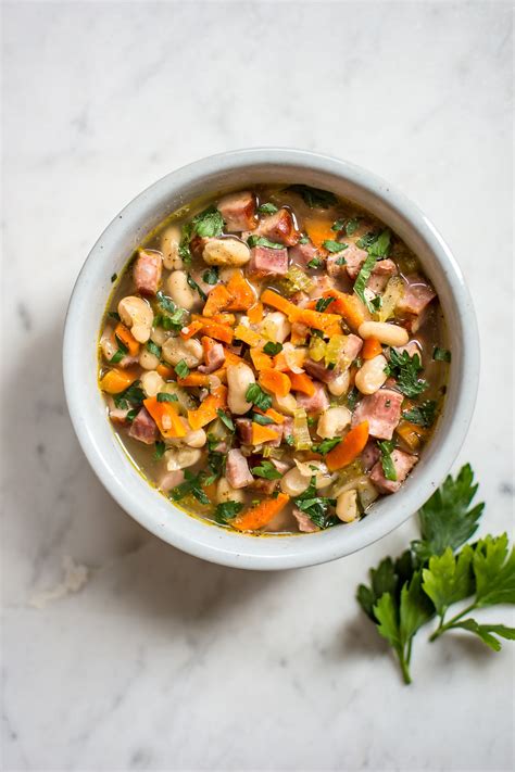 Enjoy this best bean soup with ham recipe that makes an easy 15 bean soup! Ham and White Bean Soup • Salt & Lavender