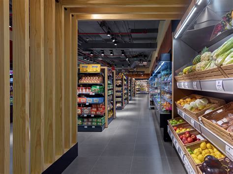 Studio Em Uses Structural Arches Creating Different Zones For A Grocery