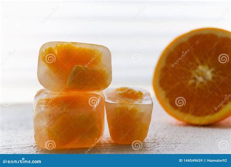 Orange Fruit Frozen In Ice Cubes White Background Stock Image Image