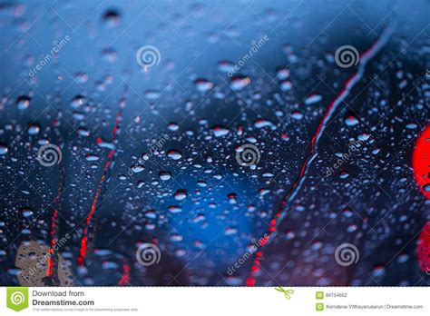 Rain Drops On Window With Road Light Bokeh Rainy Season Stock Photo