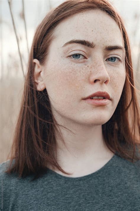 Portrait Of A Girl With Freckles By Stocksy Contributor Andrei Aleshyn Stocksy