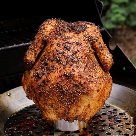 grilled beer can chicken from a whole chicken is grilled over a half