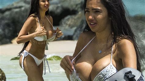 Chloe Khan Suffers Bikini Wardrobe Malfunction As She Pops Out Of Tiny Top In Barbados Mirror