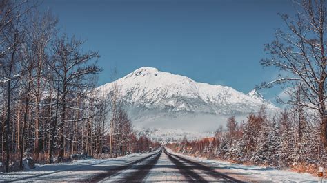 Download Wallpaper 1920x1080 Road Mountains Snow Trees