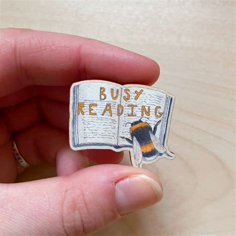 Busy Reading Books Pin The Curious Cactus