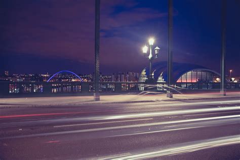 Free Photo Time Lapse Photography Of A Bridge During Night Time