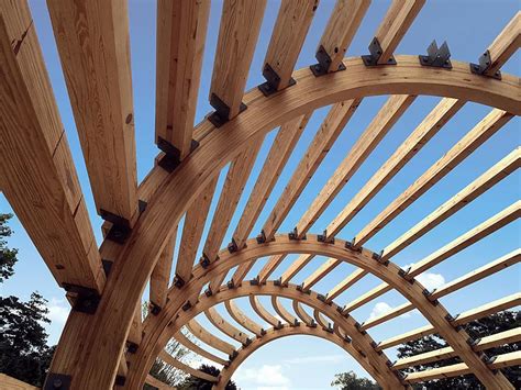 Wood Times Blog Curved Glulam Beams Create Unique Cocoon House