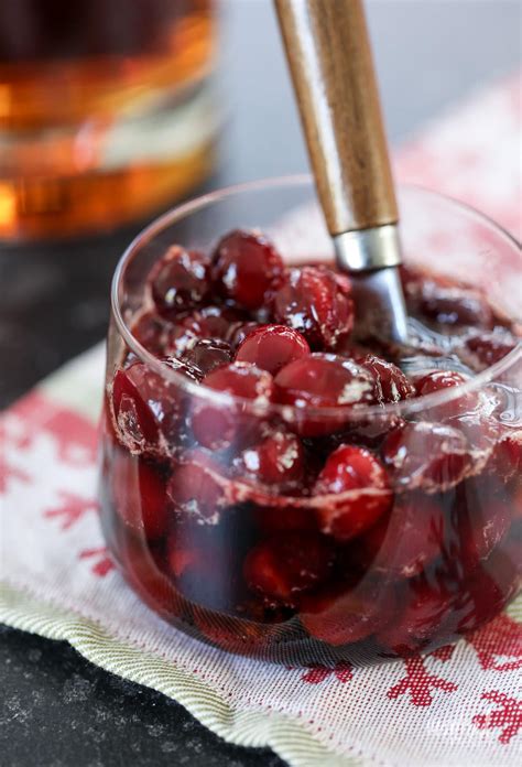 This hot buttered bourbon is the ultimate warm christmas drink. Maple Cranberry Bourbon Cocktail - Holiday Cocktail Recipe