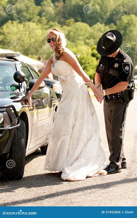 A Bride Is Arrested On Her Wedding Day Stock Photo Image Of Convict