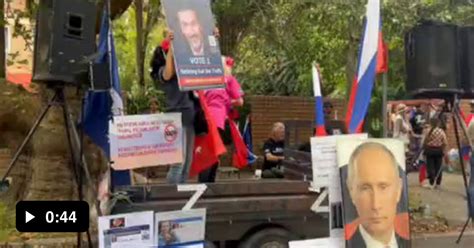 Australians With Tricolors Russian Flag And Portraits Of Putin