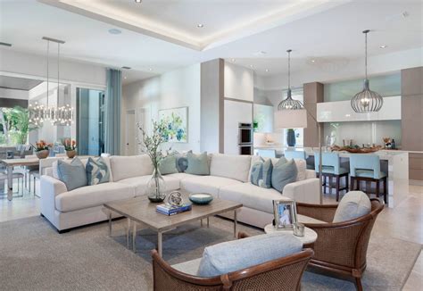 Beautiful beige room with splashes of bright blue and a bright blue acent wall. Beautiful Beach house style white and blue living room decor with white sec… (With images ...