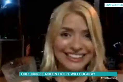holly willoughby takes time out from boozy i m a celebrity wrap party to video call phillip