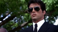 The pair of Ray-Ban Aviator sunglasses in black worn by Rocky Balboa ...