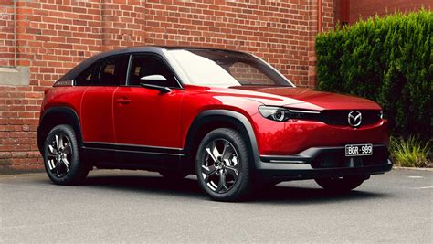 Why Mazda thinks 2021 MX-30 M Hybrid buyers will pick the new small SUV over the closely related ...