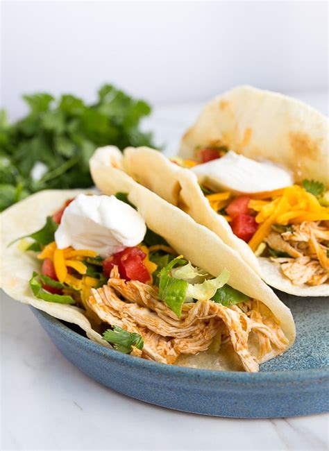 One night i added a little cream cheese and some chicken with some extra ingredients like corn and black beans…….and creamy chicken taco soup instant pot recipe was born. Instant Pot Chicken Tacos - Shredded Chicken in the ...