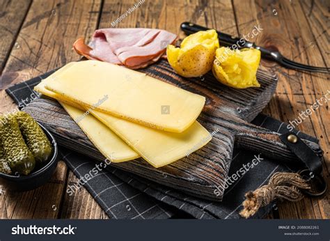 Raclette Slices Over Royalty Free Licensable Stock Photos