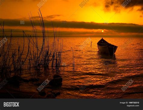 Beautiful Sunset Over Water Image And Photo Bigstock