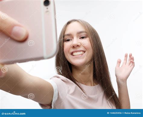 Happy Smiling Young Woman Wearing Taking Selfie With Smartphone Stock