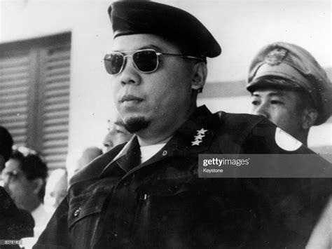 South Vietnams Premier General Nguyen Khanh Attending A Meeting In