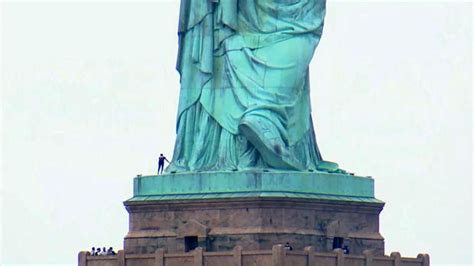 Police Reach Woman Who Climbed Onto Statue Of Liberty