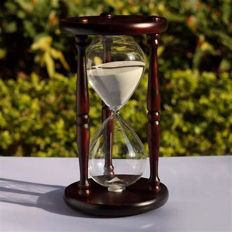 An Hourglass Sitting On Top Of A Table
