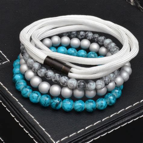 Also buckles, skulls, beads, paracord supplies Beaded + Paracord Bracelet // Teal + White // 4 pack - Tag Twenty Two - Touch of Modern