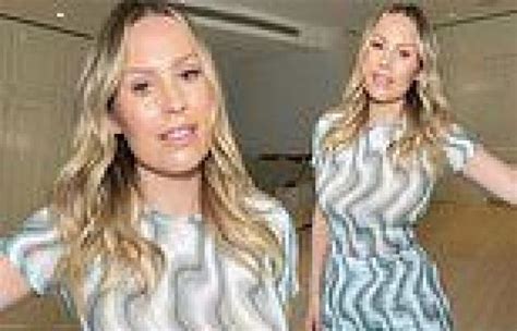 kate ferdinand shows off her figure in a form fitting patterned dress as she